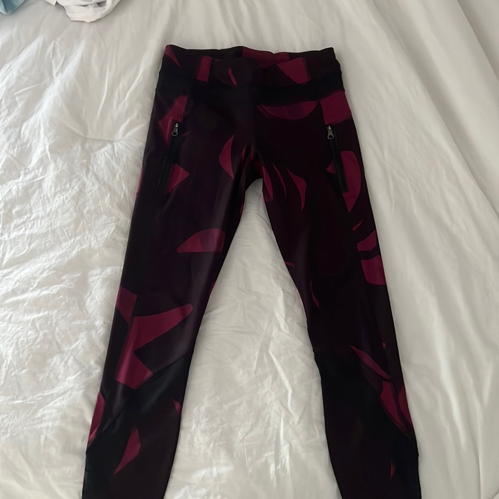 Lulu lemon size 4 leggings. Colors black/grey/pink